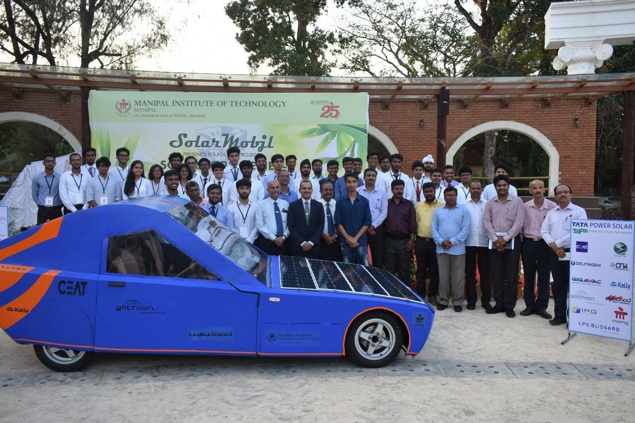 SolarMobil's SM S-2 solar car, a sleek, blue, two-seater cruiser class vehicle designed for endurance racing.